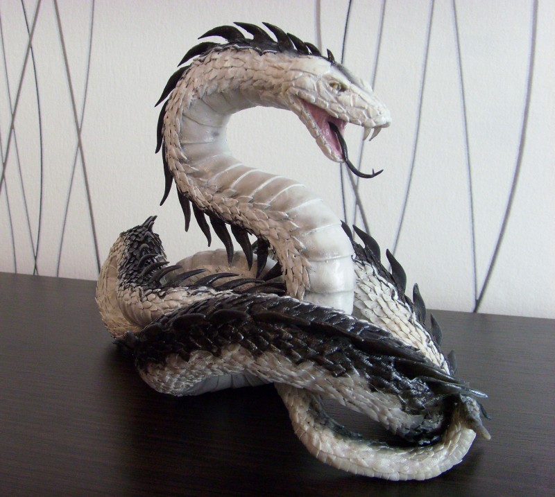 White snake statue with air clay by handmade 