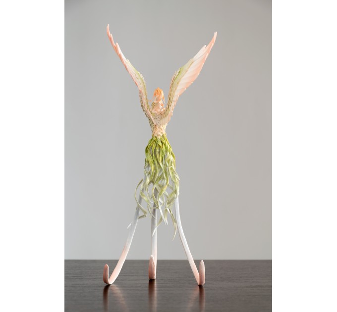 Handmade Phoenix Statue bird made of air clay. Pink and green bird
