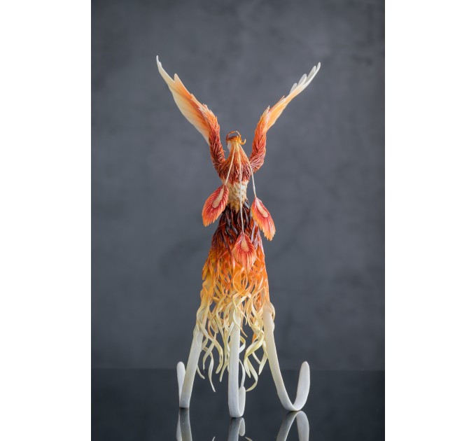 Handmade Phoenix Statue bird made of air clay. Fire bird