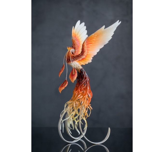 Handmade Phoenix Statue bird made of air clay. Fire bird