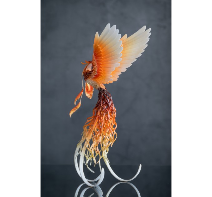 Handmade Phoenix Statue bird made of air clay. Fire bird