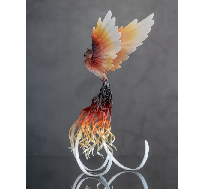 Handmade Phoenix Statue bird made of air clay. Fire bird