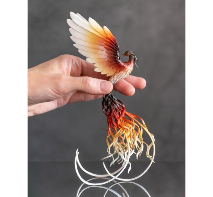 Handmade Phoenix Statue bird made of air clay. Fire bird