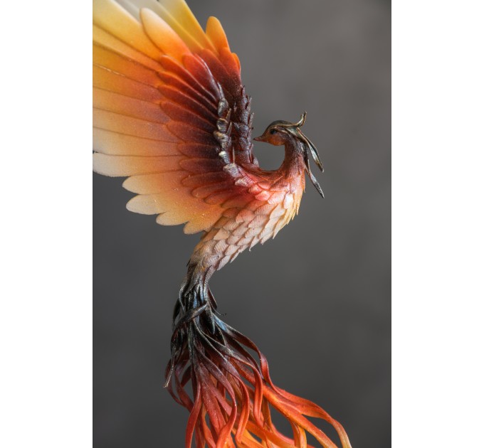 Handmade Phoenix Statue bird made of air clay. Fire bird