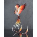 Handmade Phoenix Statue bird made of air clay. Fire bird