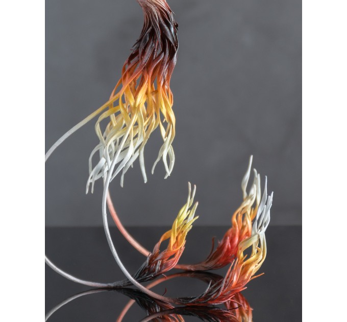 Handmade Phoenix Statue bird made of air clay. Fire bird