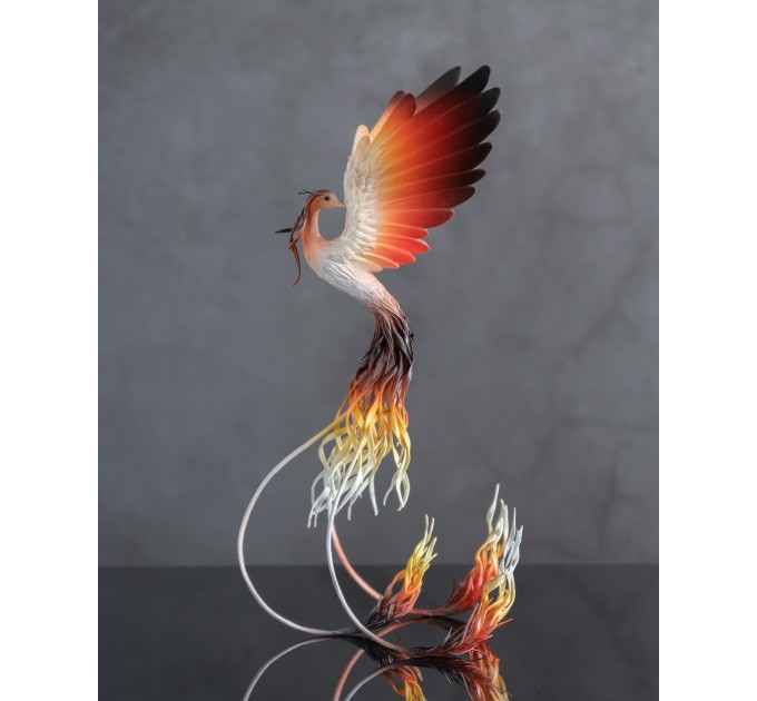 Handmade Phoenix Statue bird made of air clay. Fire bird