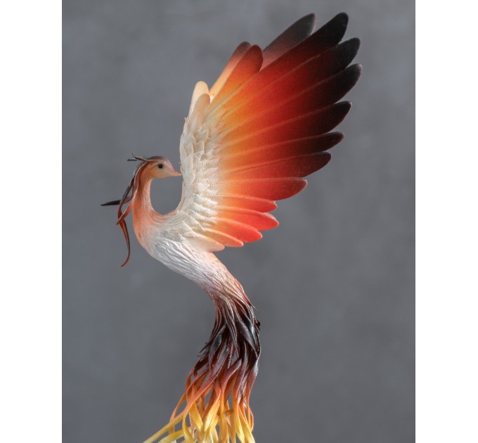 Handmade Phoenix Statue bird made of air clay. Fire bird