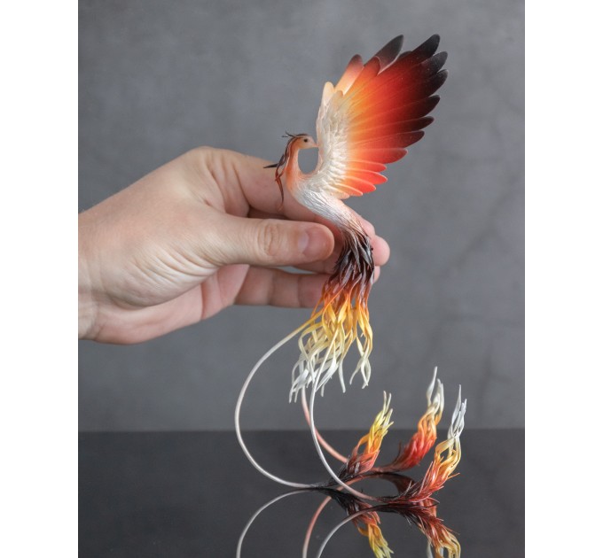 Handmade Phoenix Statue bird made of air clay. Fire bird