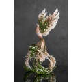 Handmade Phoenix Statue bird made of clay. Pink and green bird