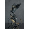 Handmade Phoenix Statue bird made of air clay. Black and gold bird