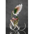 Handmade Phoenix Statue bird made of clay. Pink and green bird