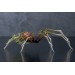 Handmade spider sculpture with a rose made of air clay