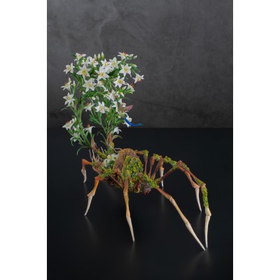 Handmade spider sculpture with lilies made of air clay