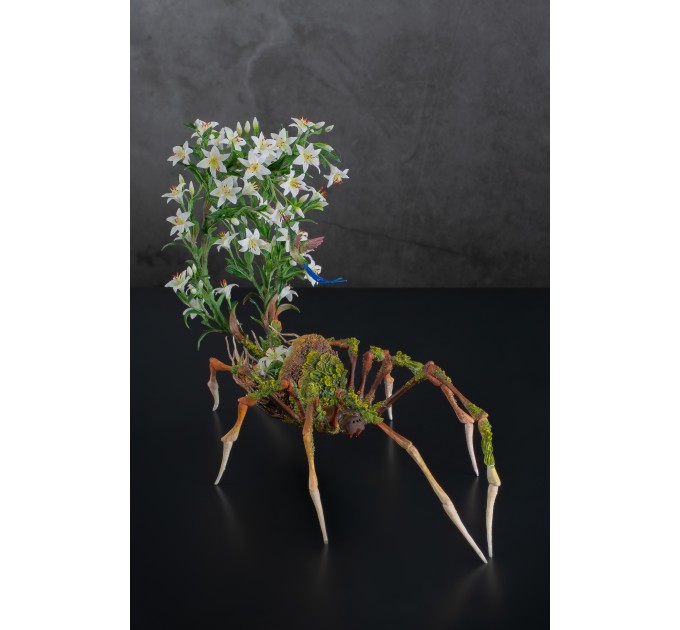 Handmade spider sculpture with lilies made of air clay