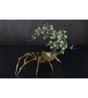 Handmade spider sculpture with lilies made of air clay