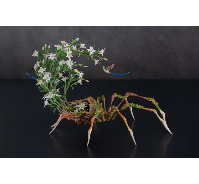 Handmade spider sculpture with lilies made of air clay