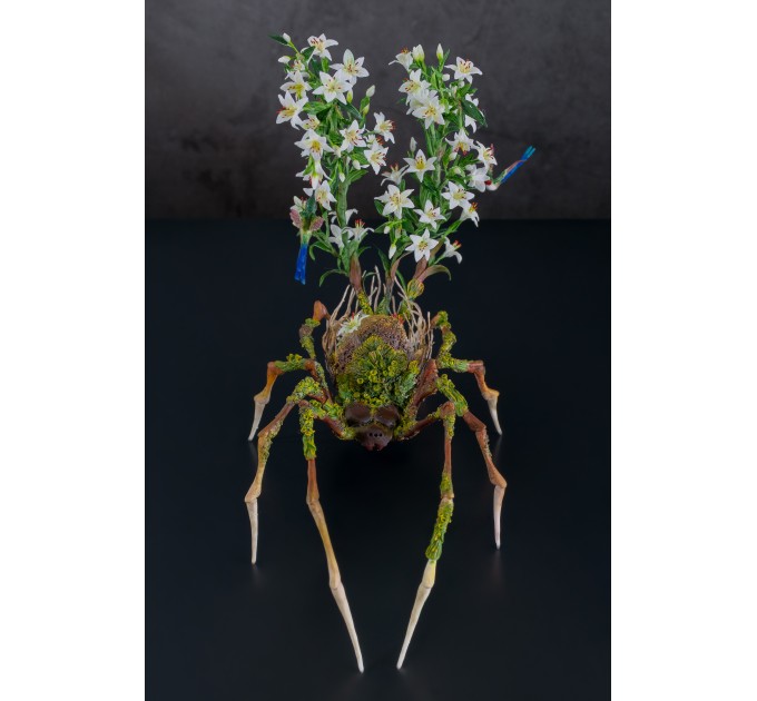 Handmade spider sculpture with lilies made of air clay