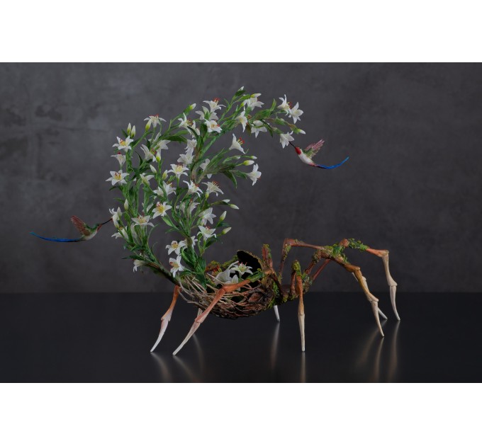 Handmade spider sculpture with lilies made of air clay