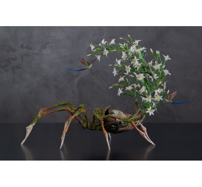 Handmade spider sculpture with lilies made of air clay