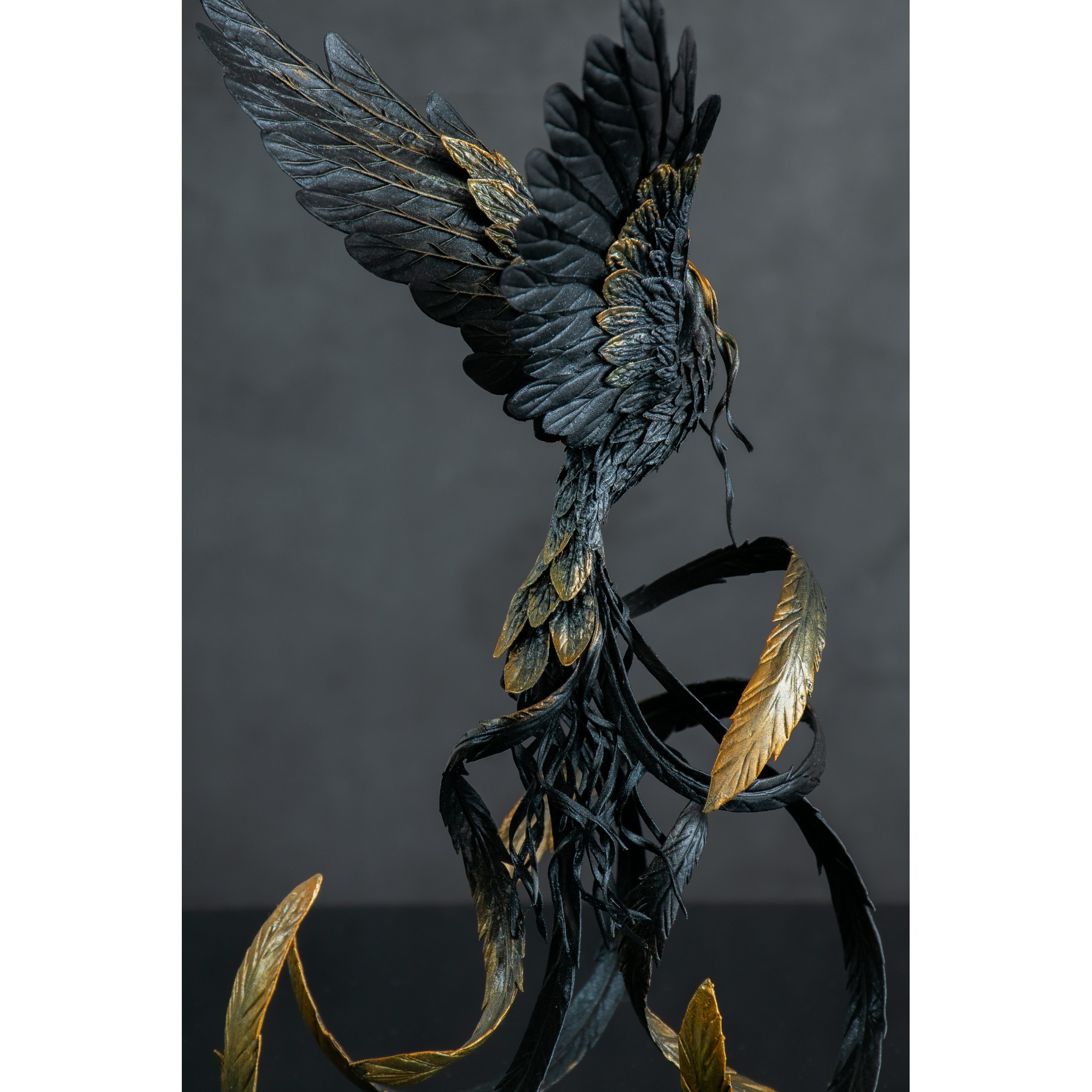 Handmade Phoenix Statue bird made of air clay. Fire bird