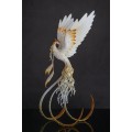 Handmade Phoenix Statue bird made of air clay. White and gold bird