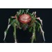 Handmade spider sculpture with a rose made of air clay.