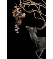 Sculpture of deer with a lantern
