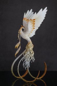 Collectible Phoenix Statue bird made of air clay. White and gold bird Collectible Phoenix Statue bird made of air clay. White and gold bird